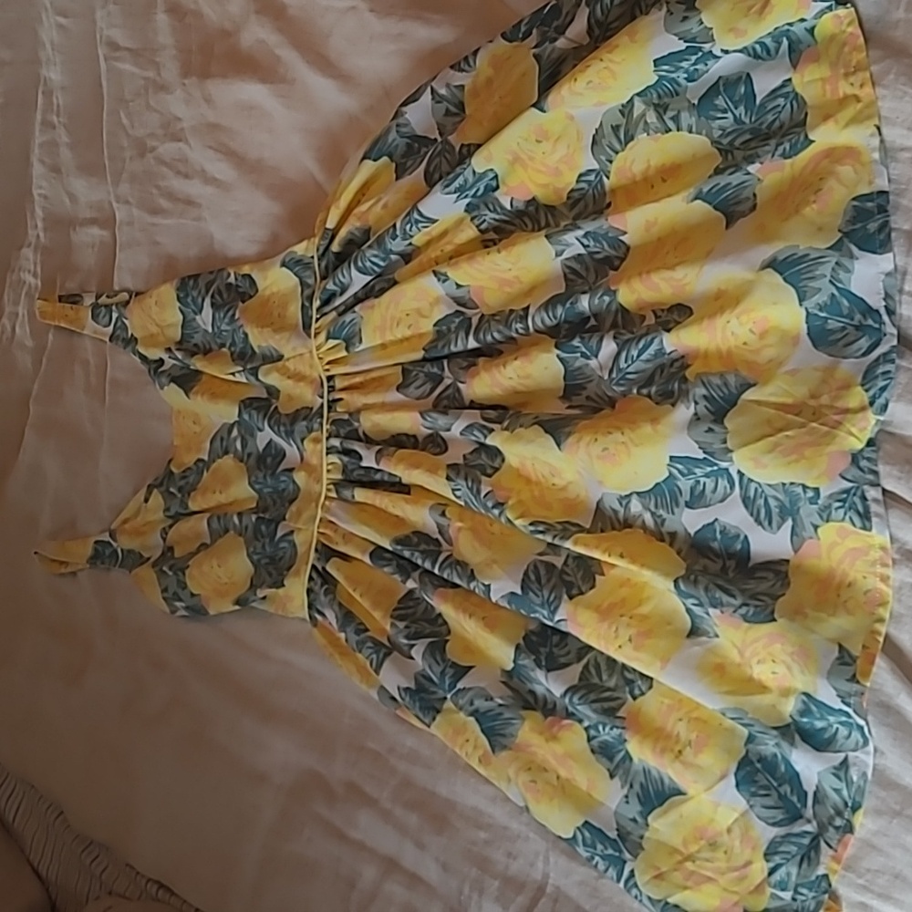 Floral dress. Knee length.